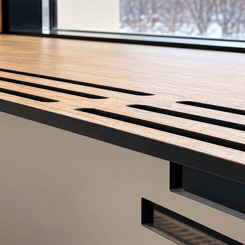 Aménagement Compacto sur mesure en finition bois pour optimiser l’espace intérieur